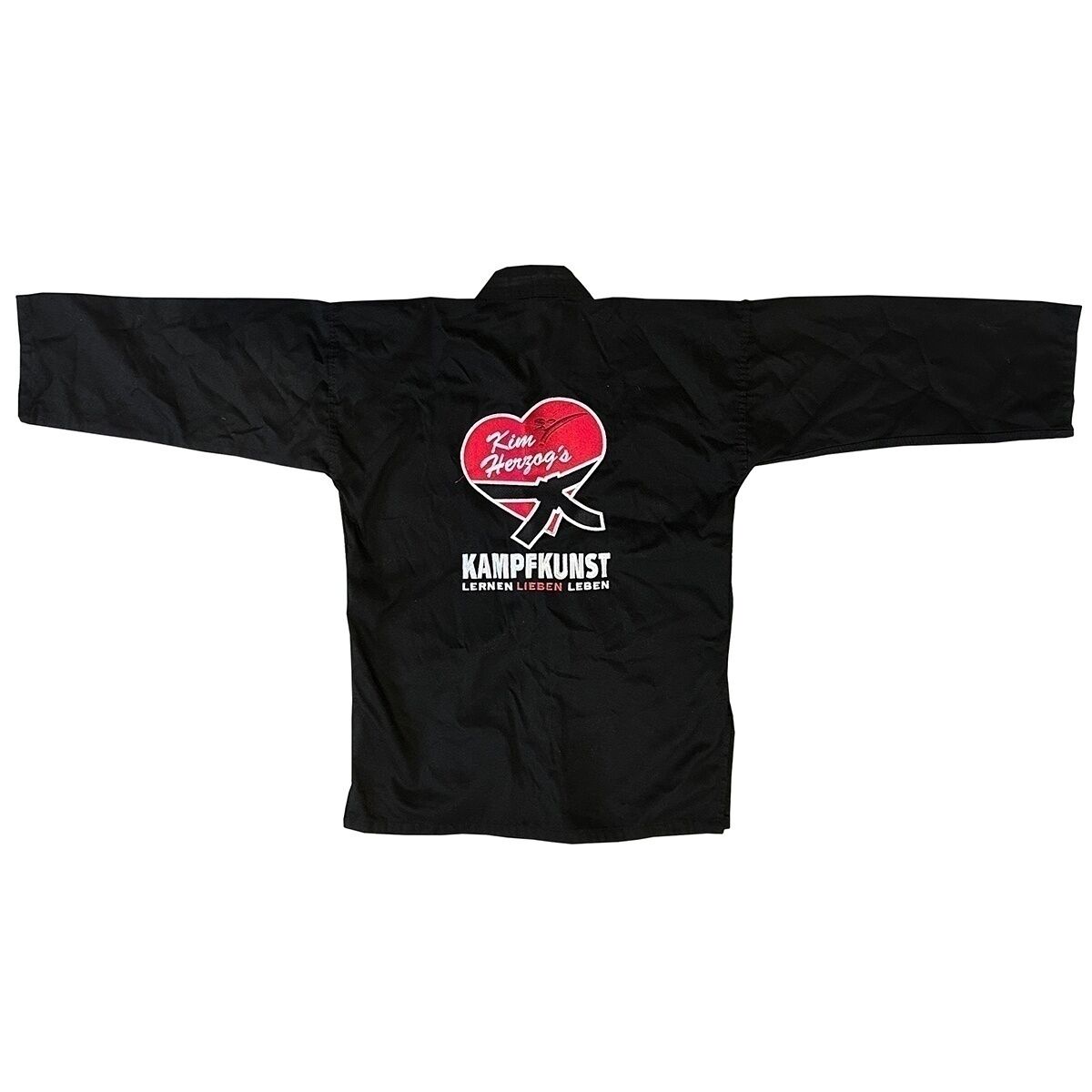 Kampfkunst-Anzug_schwarz_Jacke_vHinten_liegend