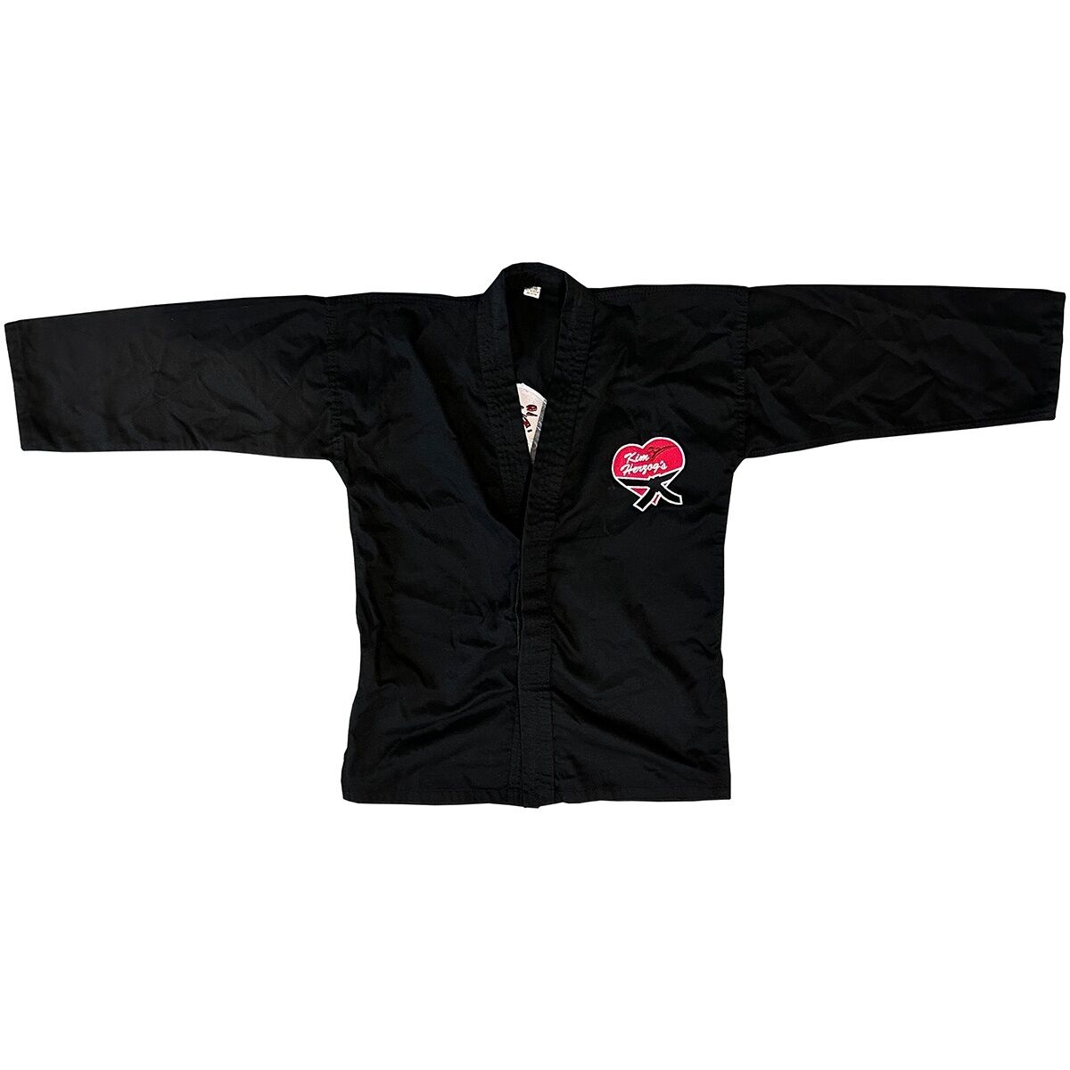 Kampfkunst-Anzug_schwarz_Jacke_vVorne_liegend